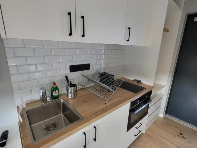 Equipped kitchen in a cabin at Landbrot Guesthouse